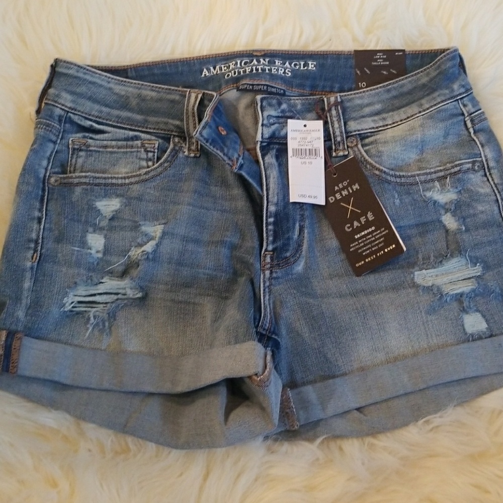 Distressed AE midi super stretch shorts.